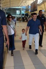 Aamir Khan snapped with Kiran Rao and Azad at airport in Mumbai on 8th March 2015